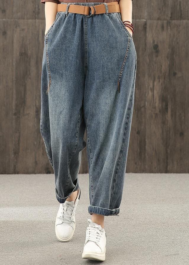 Pantalon décontracté en denim délavé rétro à décoration de ligne lumineuse pour l'automne