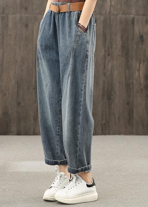 Pantalon décontracté en denim délavé rétro à décoration de ligne lumineuse pour l'automne