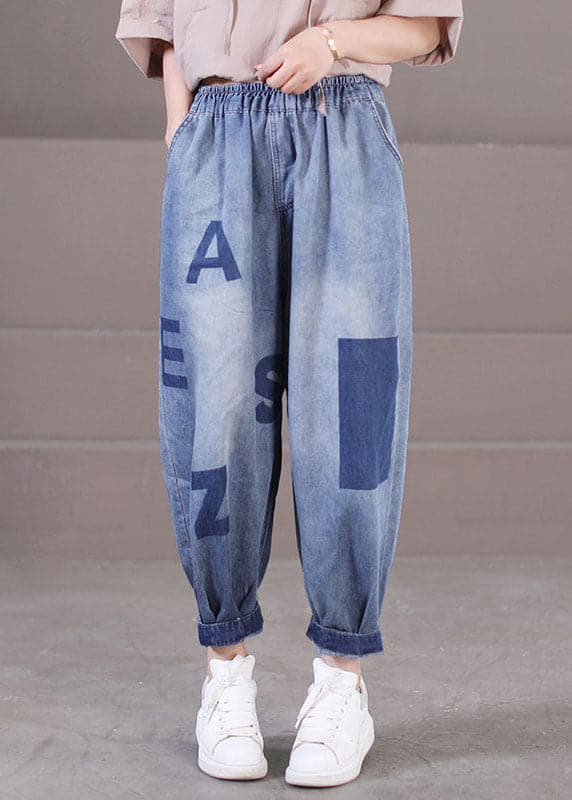 Pantalon sarouel en denim de coton bleu ample avec poches à taille élastique et imprimé lettre pour l'été