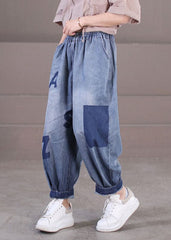 Pantalon sarouel en denim de coton bleu ample avec poches à taille élastique et imprimé lettre pour l'été