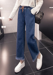 Pantalon ample en denim bleu avec taille élastique et cordon de serrage, poches à pompons, en coton, jambes larges, été