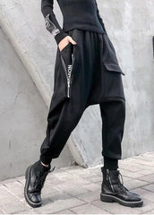 Pantalon à grandes poches avec fermeture éclair noire de style garde-robe