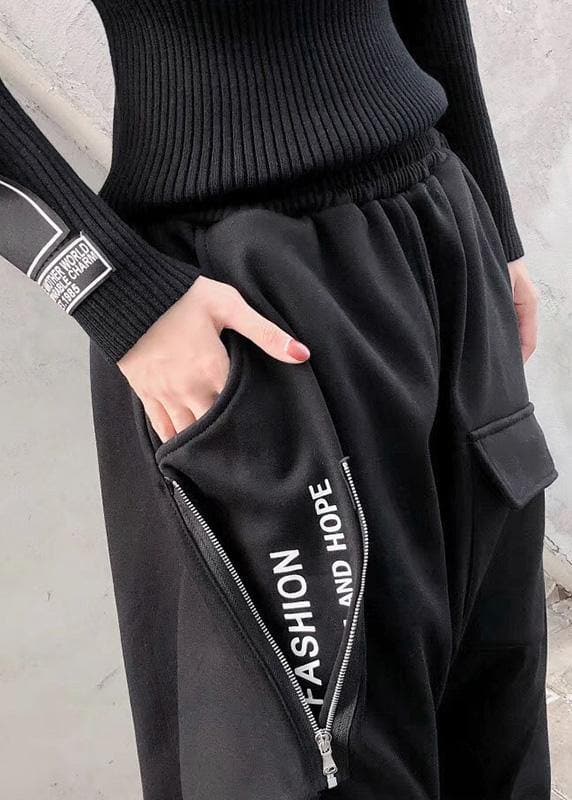 Pantalon à grandes poches avec fermeture éclair noire de style garde-robe