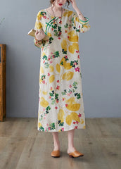 Robe ample vintage en coton imprimé jaune à col rond et ouverture latérale, manches trois-quarts