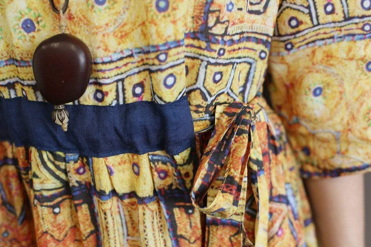 Robe mi-longue taille empire à géométrie sacrée 