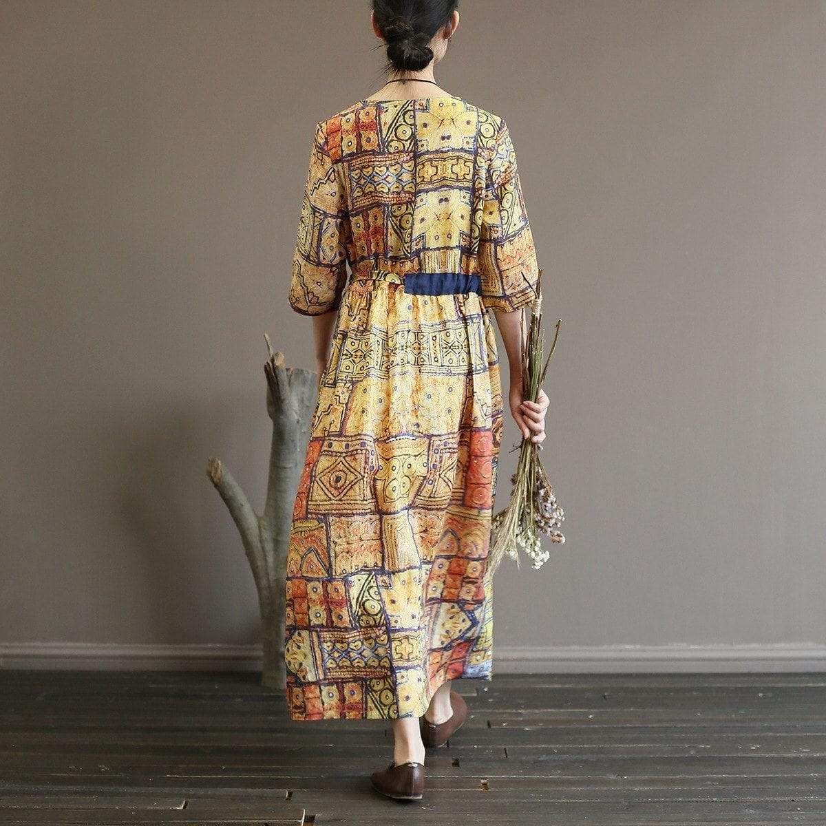 Robe mi-longue taille empire à géométrie sacrée 